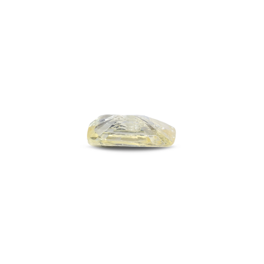 Yellow Sapphire side view on white bg